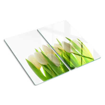 Glass chopping board Tulips against a background of green leaves