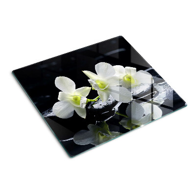 Glass chopping board Orchids on a black background