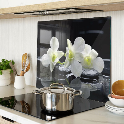 Glass chopping board Orchids on a black background
