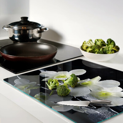 Glass chopping board Orchids on a black background