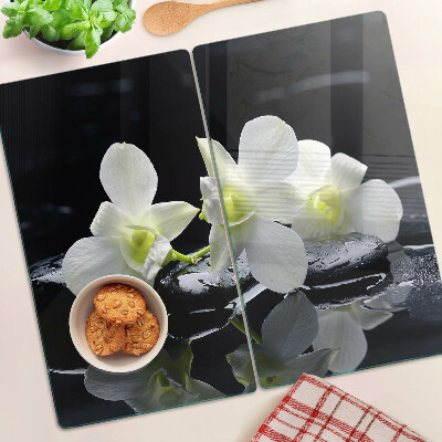 Glass chopping board Orchids on a black background