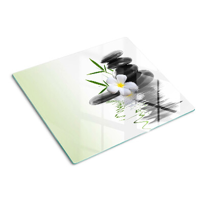 Glass chopping board Flowers and stones on the water