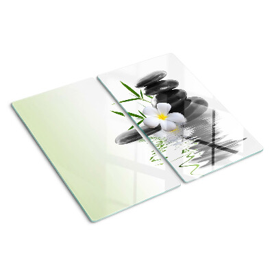 Glass chopping board Flowers and stones on the water