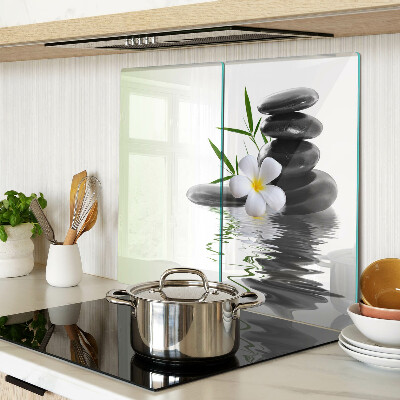 Glass chopping board Flowers and stones on the water