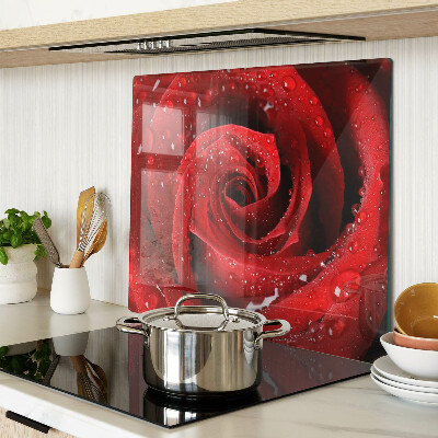 Glass kitchen board Red rose with water drops