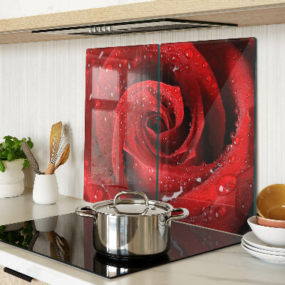 Glass kitchen board Red rose with water drops
