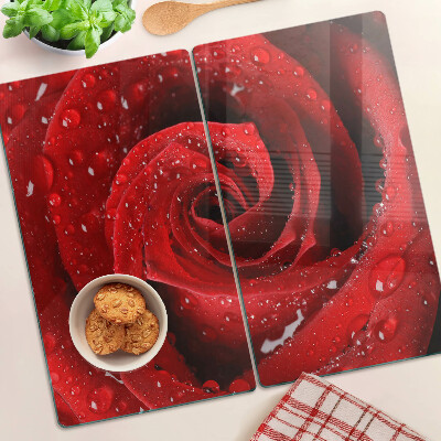 Glass kitchen board Red rose with water drops