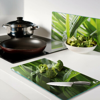 Glass kitchen board Drops of water on the grass