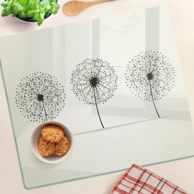 Glass chopping board Dandelions on a white background