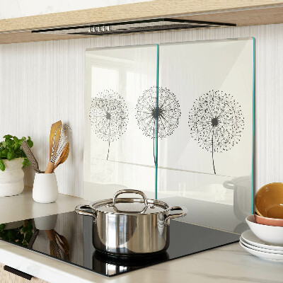 Glass chopping board Dandelions on a white background