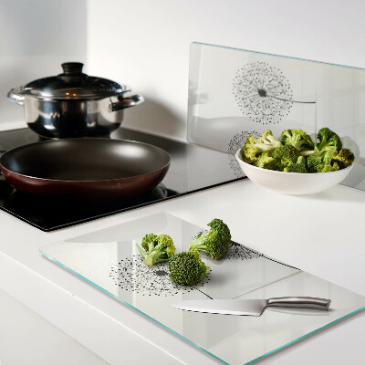 Glass chopping board Dandelions on a white background