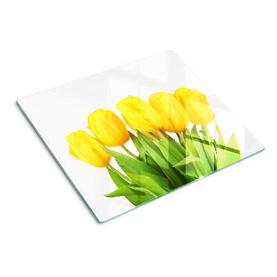 Glass kitchen board Yellow tulips on a green background