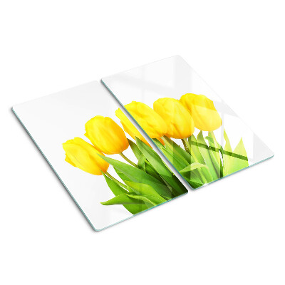 Glass kitchen board Yellow tulips on a green background