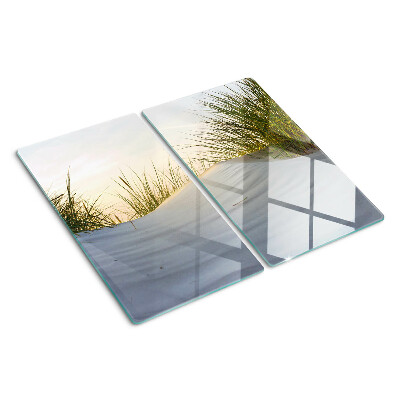 Glass chopping board Green grass against the sky