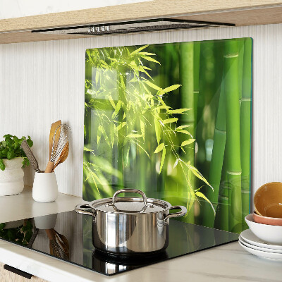 Glass chopping board Bamboo leaves and green foliage