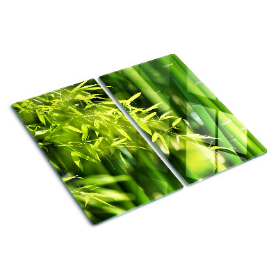 Glass chopping board Bamboo leaves and green foliage