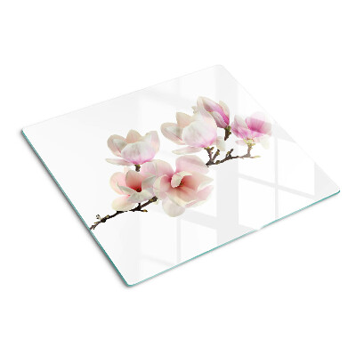 Glass chopping board Magnolia flowers on a branch