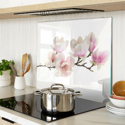 Glass chopping board Magnolia flowers on a branch