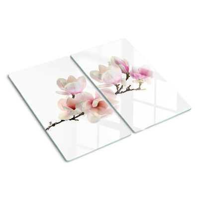 Glass chopping board Magnolia flowers on a branch