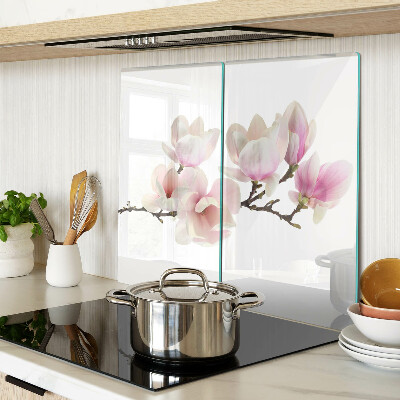 Glass chopping board Magnolia flowers on a branch