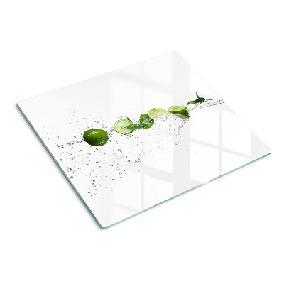Glass chopping board Lemons in water
