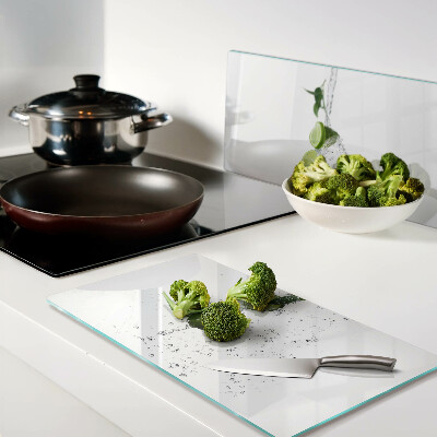 Glass chopping board Lemons in water