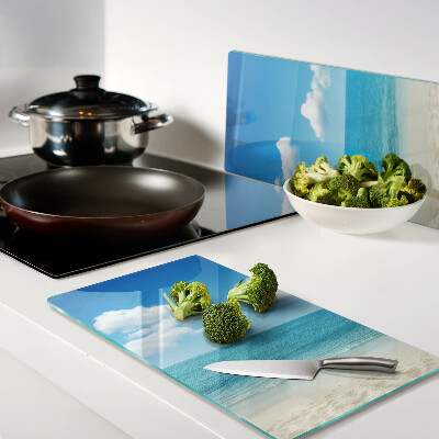 Glass kitchen board Beach with blue sky