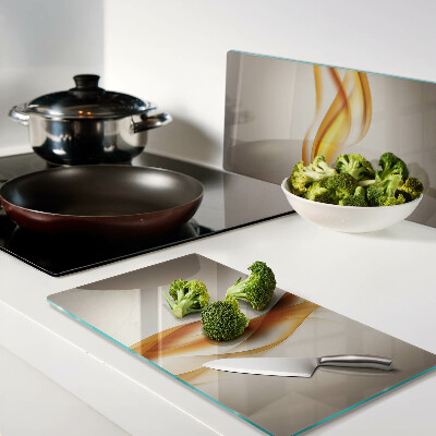 Glass chopping board Waves in shades of gold