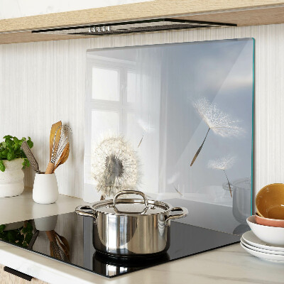 Glass chopping board Dandelions in the background of the window