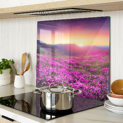 Glass kitchen board Flower landscape at sunset