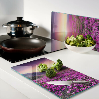 Glass kitchen board Flower landscape at sunset