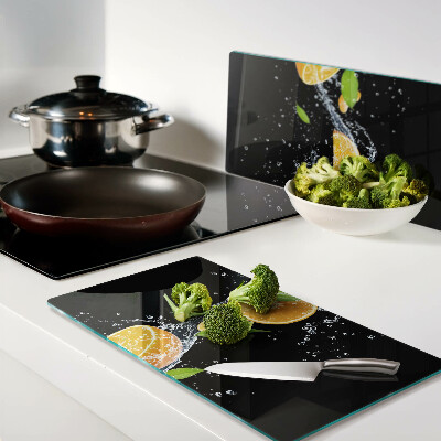 Glass kitchen board Citrus in water