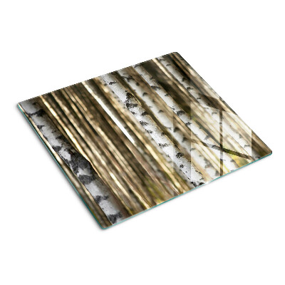 Glass chopping board White birches in the forest