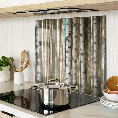 Glass chopping board White birches in the forest