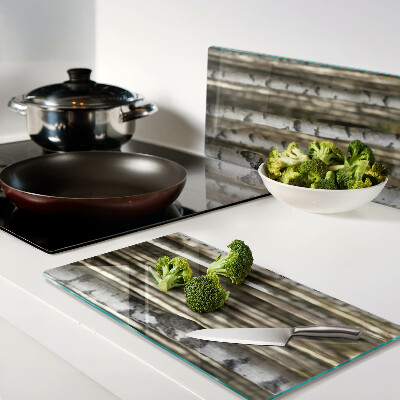 Glass chopping board White birches in the forest
