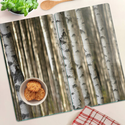 Glass chopping board White birches in the forest