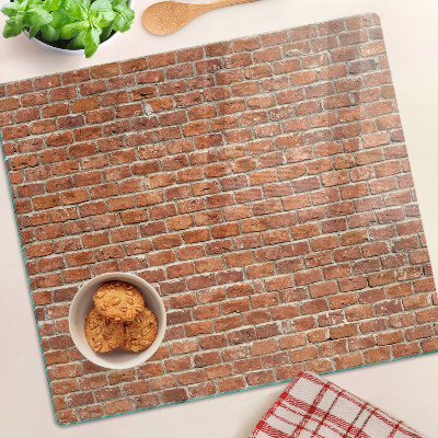 Glass chopping board Brick wall
