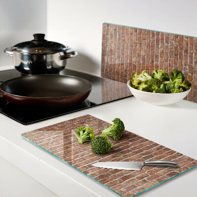 Glass chopping board Brick wall