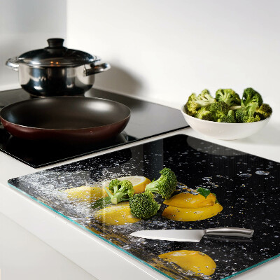 Glass kitchen board Lemons in water