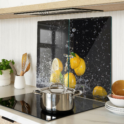 Glass kitchen board Lemons in water