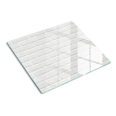 Glass chopping board Brick wall