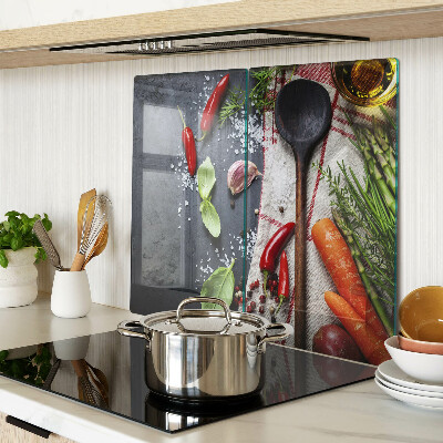 Glass chopping board Kitchen spices and vegetables
