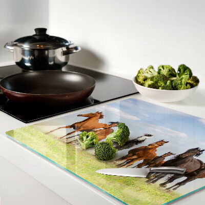 Glass chopping board Galloping horses in the meadow