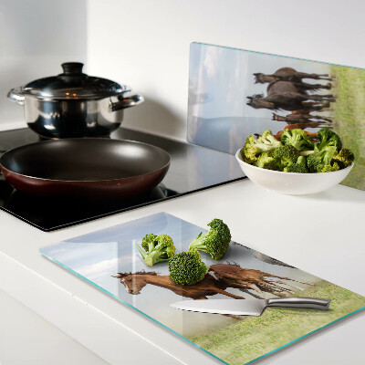 Glass chopping board Galloping horses in the meadow