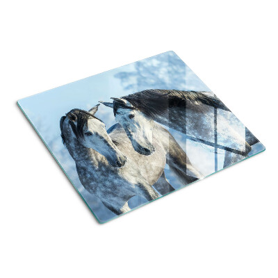 Glass kitchen board Horses in a winter landscape
