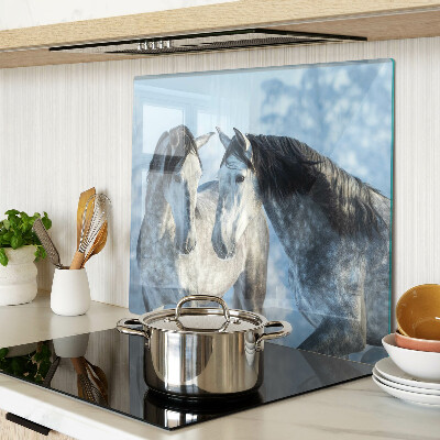 Glass kitchen board Horses in a winter landscape