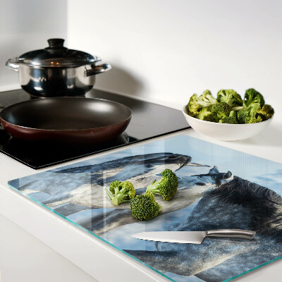 Glass kitchen board Horses in a winter landscape