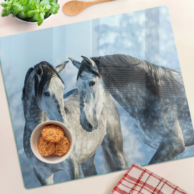 Glass kitchen board Horses in a winter landscape