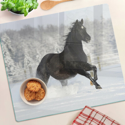 Glass chopping board A horse in a winter landscape