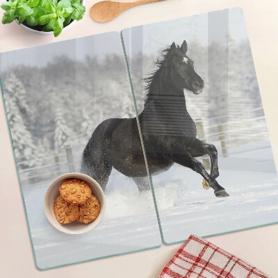 Glass chopping board A horse in a winter landscape